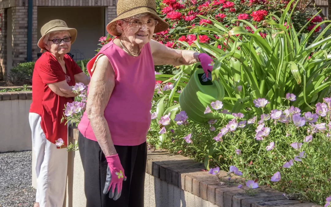 Delmar Gardens of Gwinnett residents gardening