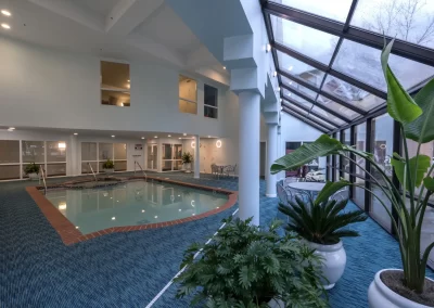 Delmar Gardens of Gwinnett atrium area by indoor pool