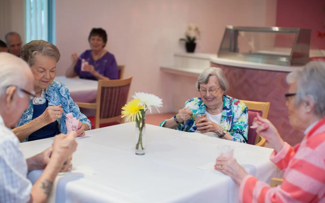 Seniors at the Garden Villas of Lenexa enjoying ice cream from the ice cream parlor