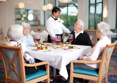 Chesterfield Villas residents having a meal in the dining room