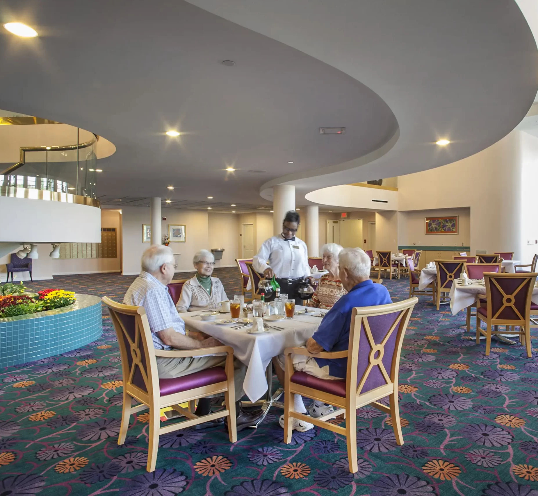 Senior Citizens dining in the dining room at Garden Villas North