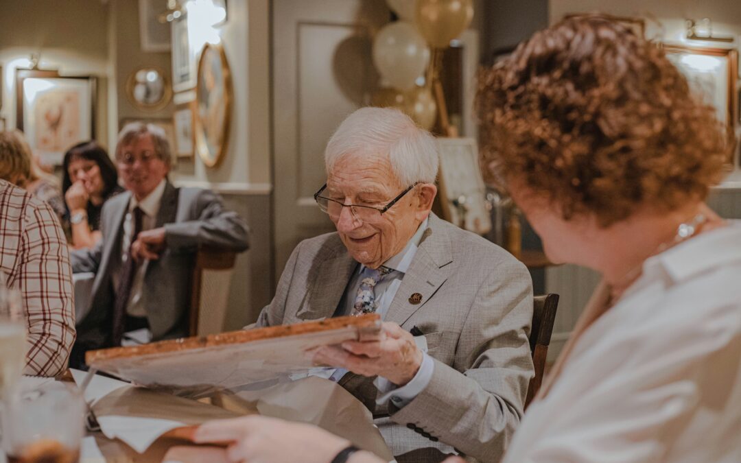 A senior citizen in skilled nursing care celebrating his birthday